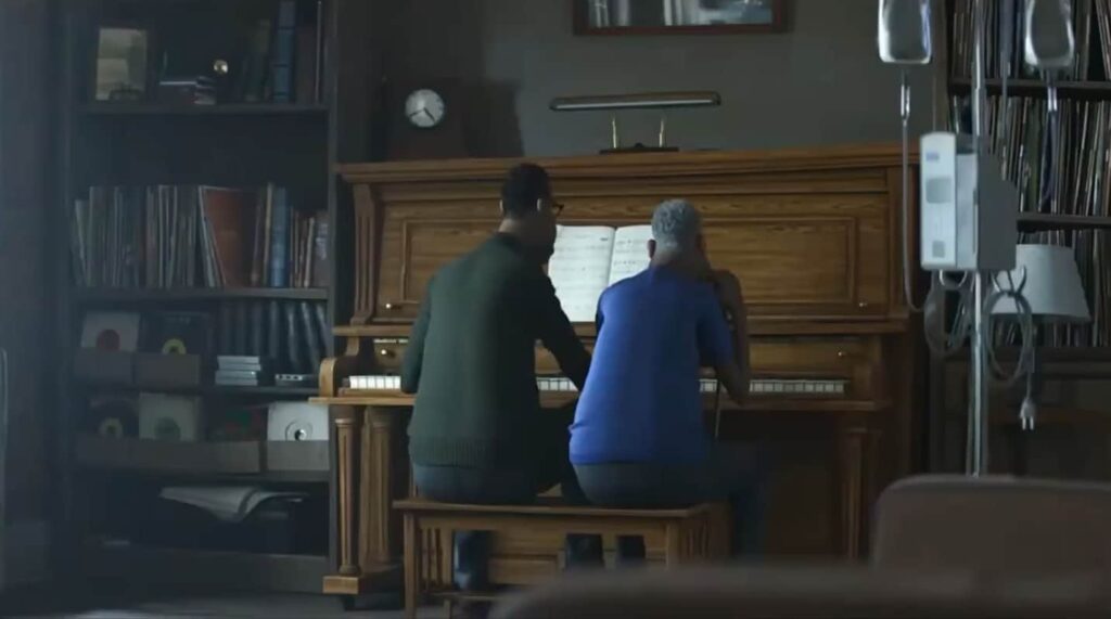 Two animated characters sitting and playing the piano in a cozy room